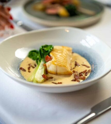 Main Roasted Ballycotton Monkfish, Ballymaloe Cider & Gubbeen Bacon Cream, Shanagarry Pak Choi