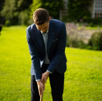 Playing croquet