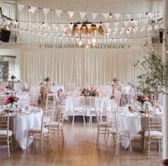 Grainstore wedding table set up photo by Kate Gray (2)